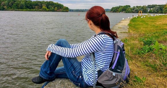 girl sitting by erie cannal