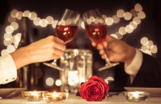 Couple toasting at dinner